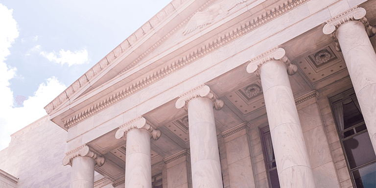 Close up of the columns on the front of the White House in Washington, D.C. 