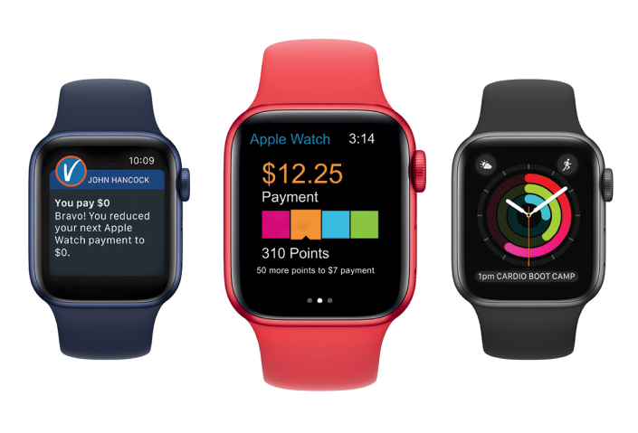 Three smart watches showing the Vitality app and the health app